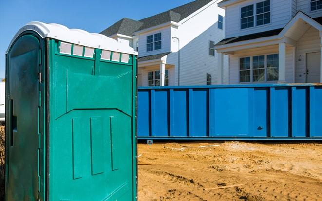 portable toilet and dumpster at a construction site project in Altadena CA